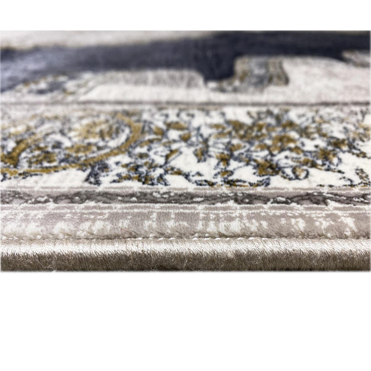 Teppich 170x240 cm Detail: gewebtes Muster am Rand mit Fransen und Zierlinien