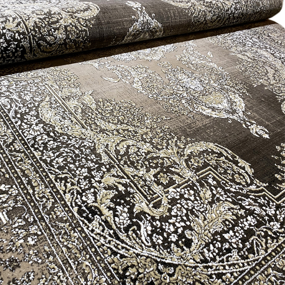 Teppich-Medaillon mit ornamentalen Schmucklinien in silbergrau und dunkel