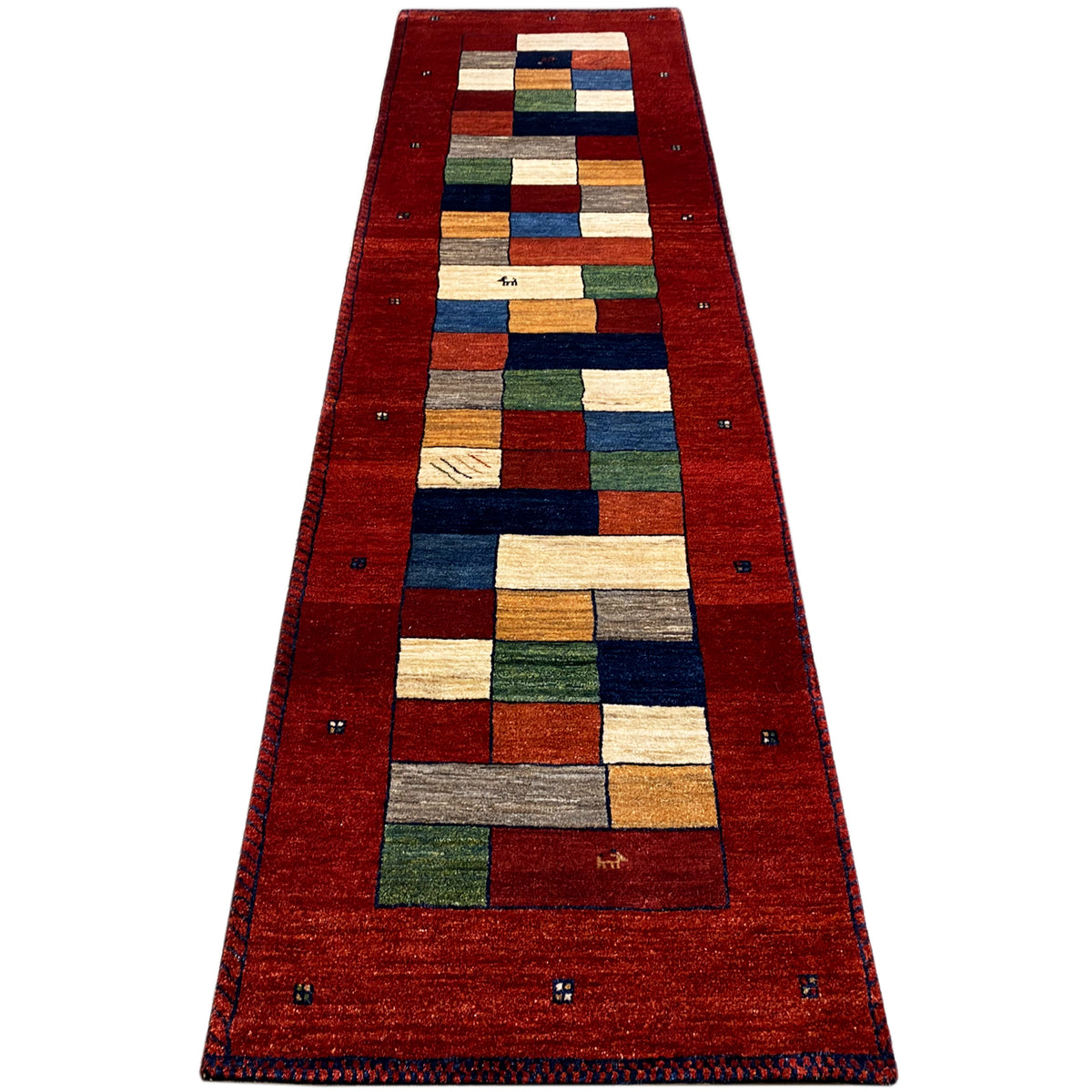 Gabbeh-Teppichläufer rot, langrechteckig mit geometrischem Mittelmotiv und Rand
