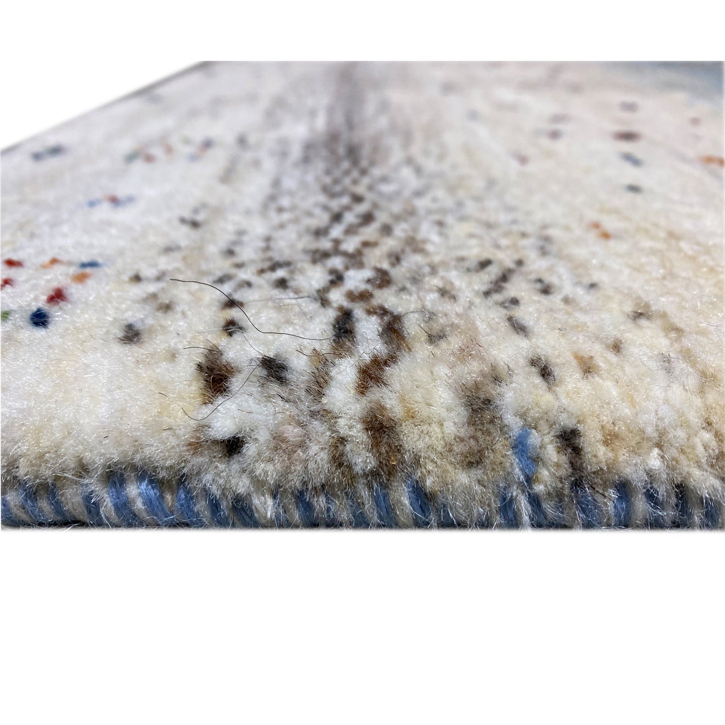 Detail Gabbeh-Teppichläufer: Flor mit Fleck-/Struktur und blau-grauer Bordüre am Rand