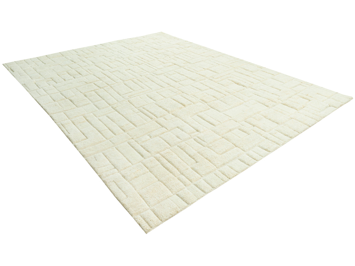 Teppich 300x250 cm cremefarben, diagonaler Blick auf das Ziegelrelief
