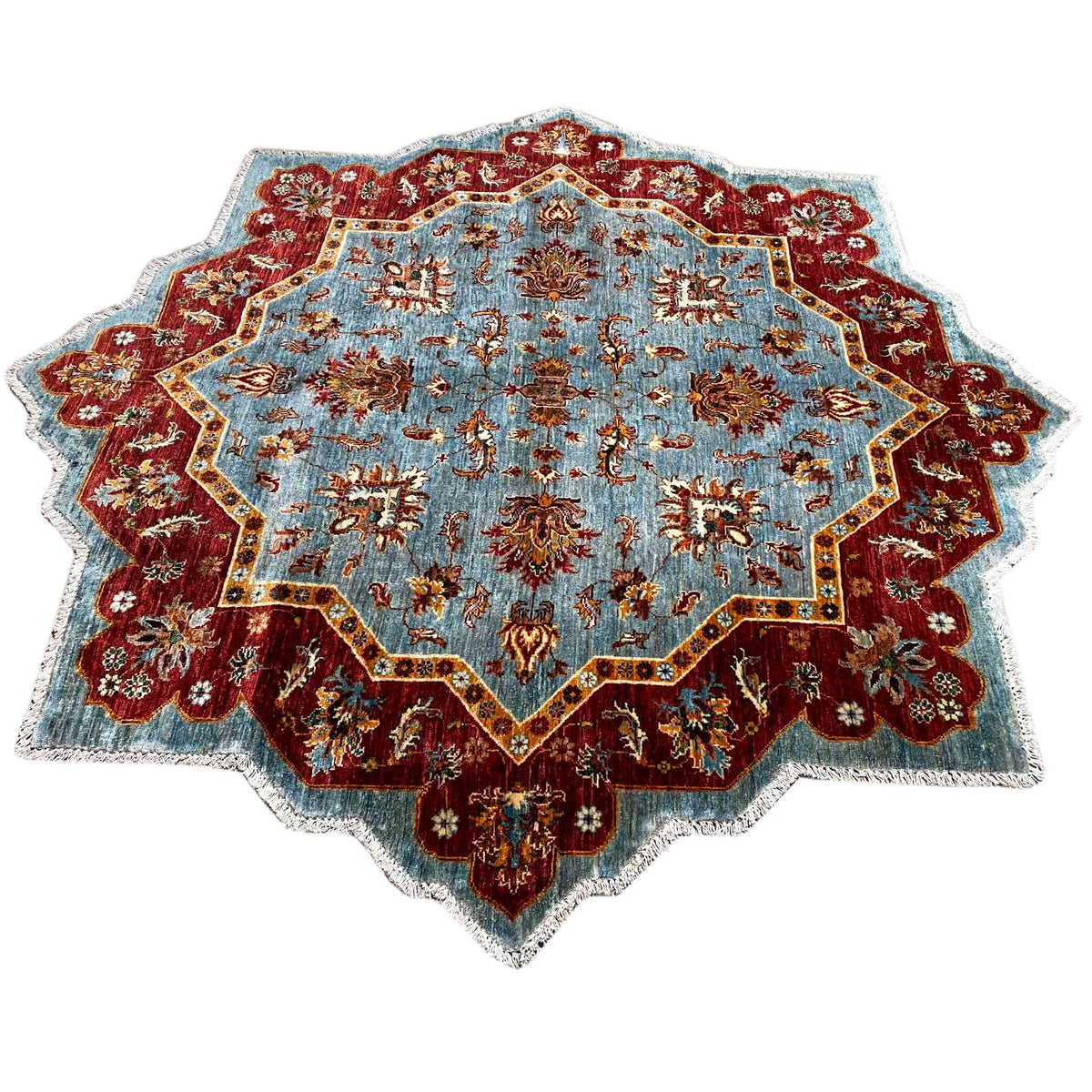 Teppich mit blauem Grund, weinroten Ornamenten und goldfarbenen Akzenten, 202x204 cm