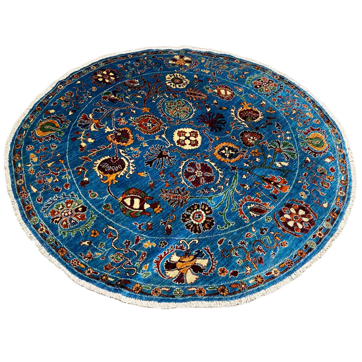Rundteppich aus Wolle, blau, mit zentralem Medaillon und durchgehendem Muster