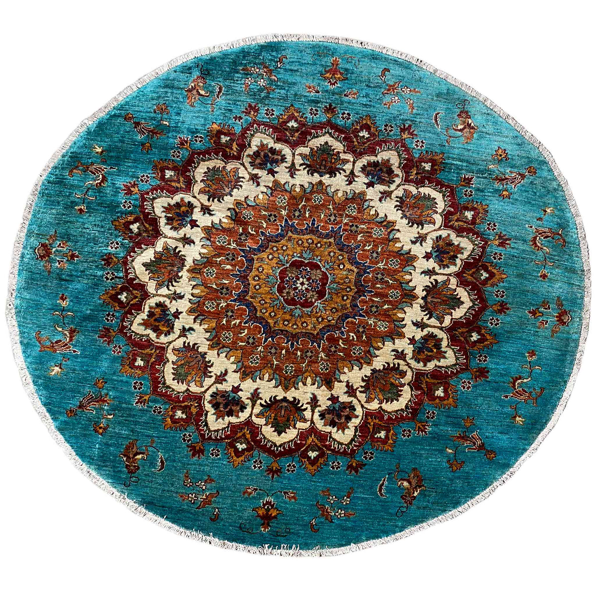 Runder Khorjin-Teppich in Türkis mit ornamentalem Mittelmedaillon und mehrfarbigem Muster.