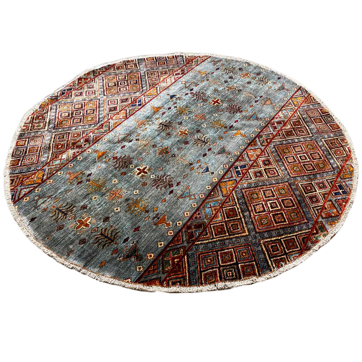 Runder handgeknüpfter Wollteppich mit blau-grauem Fond und bunten Ornamenten in Braun/Orange