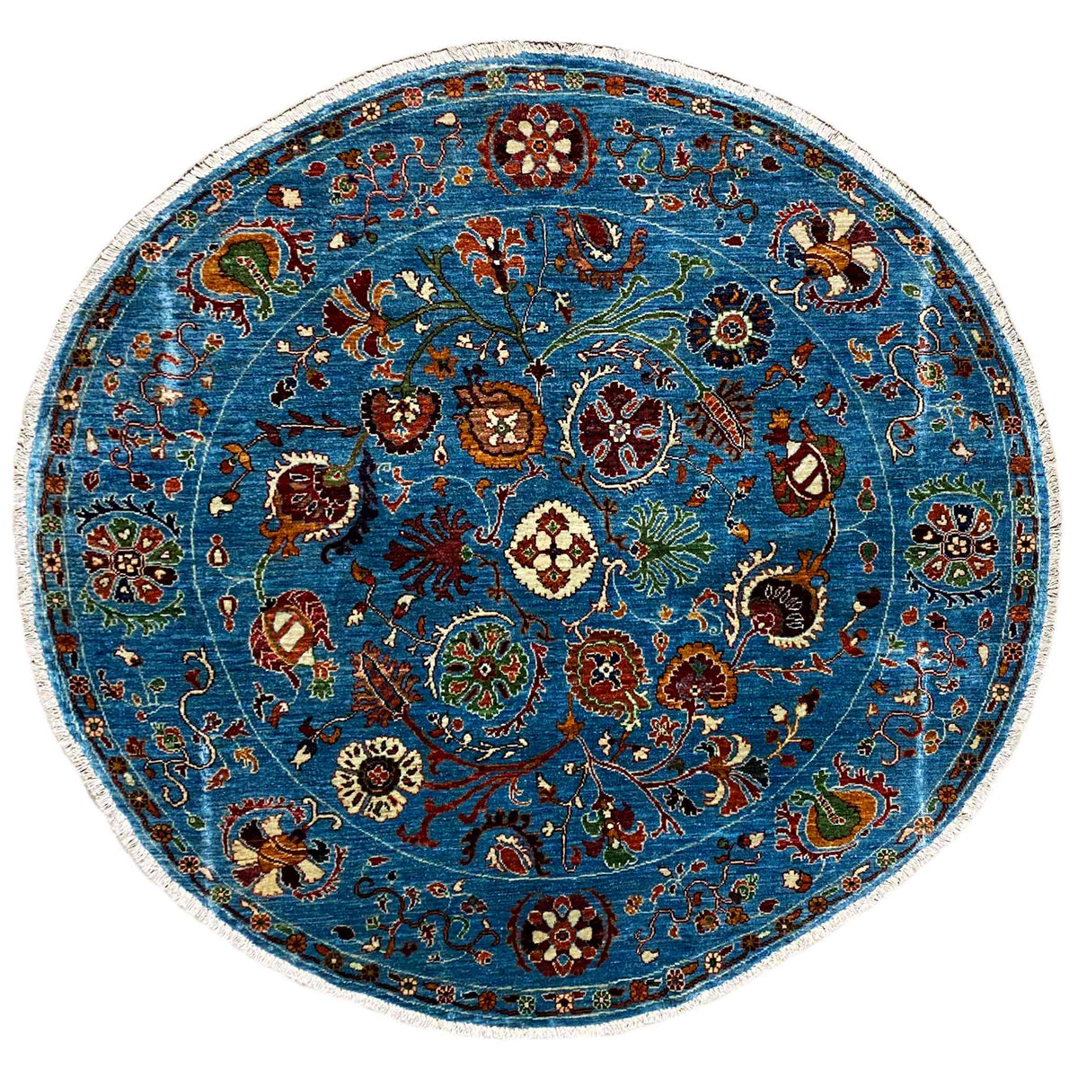 Runder Wollteppich in Blau mit farbigem Blumen- und Ornamentmuster sowie Randbordüre