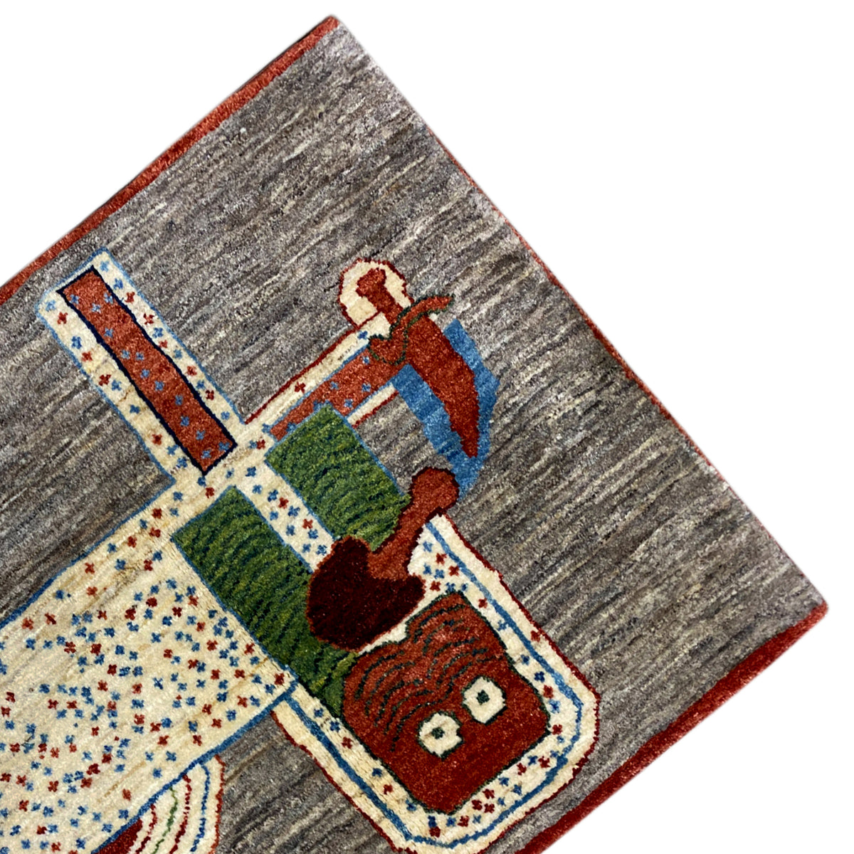 Löwen-Gabbeh-Teppich 117x79 cm Eckansicht mit farbigem Tiermotiv und Zierumrandung