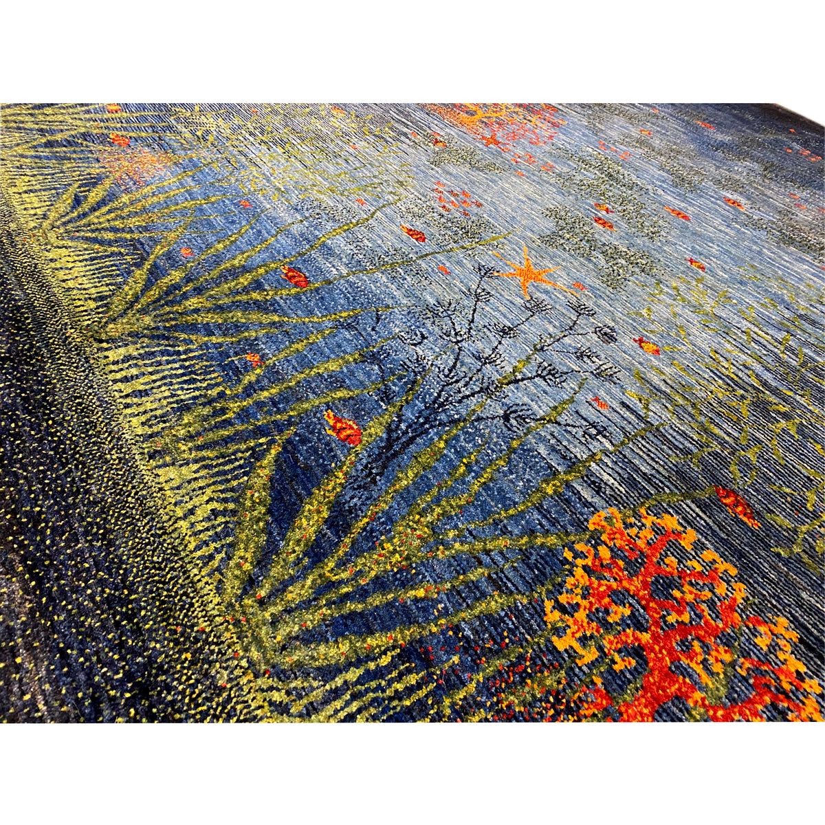 Teppich-Textur: dichter Flor in Blau, Gelb-Grün und orangefarbene Sprenkel