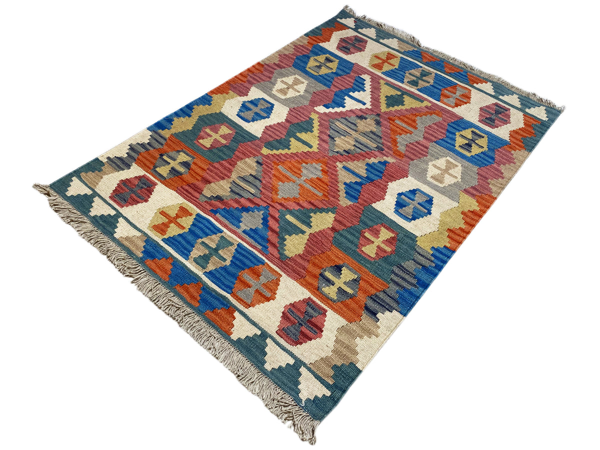 Qashqai-Kelimteppich mit mehrfarbigen Mustern, blauem Rand und Fransen