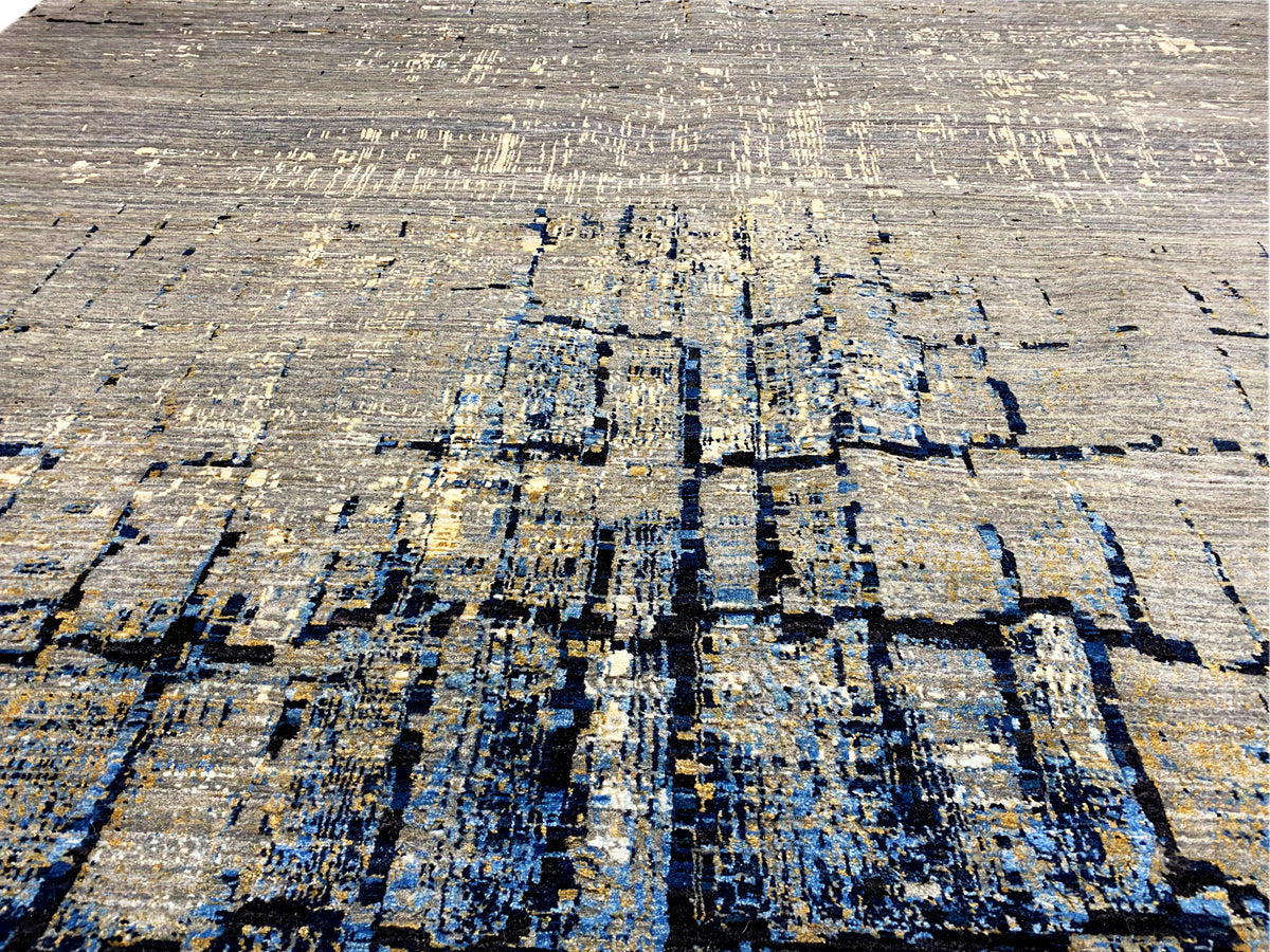 Handgeknüpfter Teppich Nahansicht: abstrakte blau-graue Blockstruktur