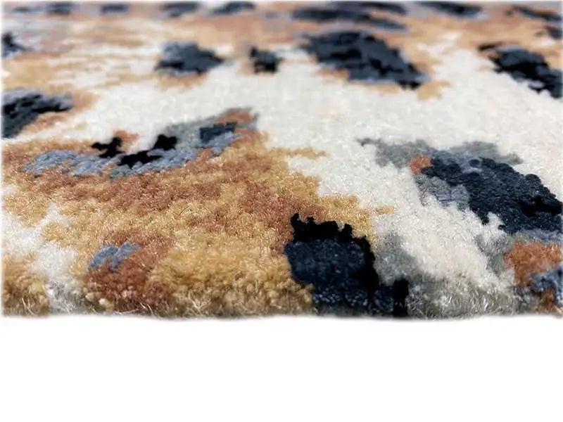 Designer-Teppich mit Bo-Hamsa-Muster, beiger Flor und braun-schwarze Detailflächen