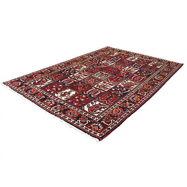 Bakhtiari-Teppich (311x213 cm), flach ausgelegt, bordeauxrot mit weißen und dunkelblauen Ornamenten