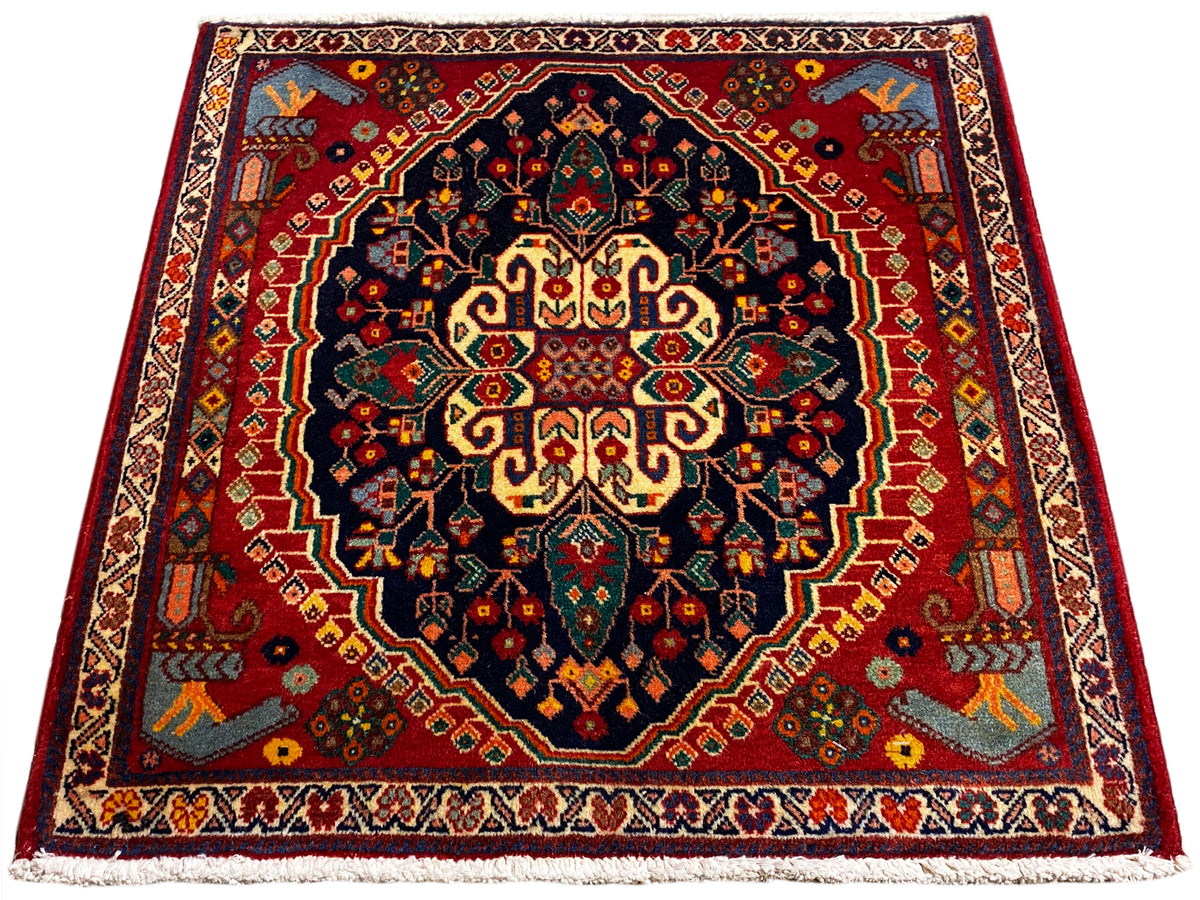 Teppich 67x60 cm quadratisch mit zentriertem Muster in Dunkelblau, Rot und Gelb