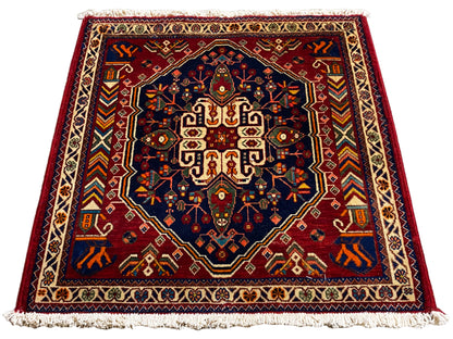 Teppich 63x60 cm, rechteckig, dunkelblaues Zentrum mit farbigem Ornamentrahmen