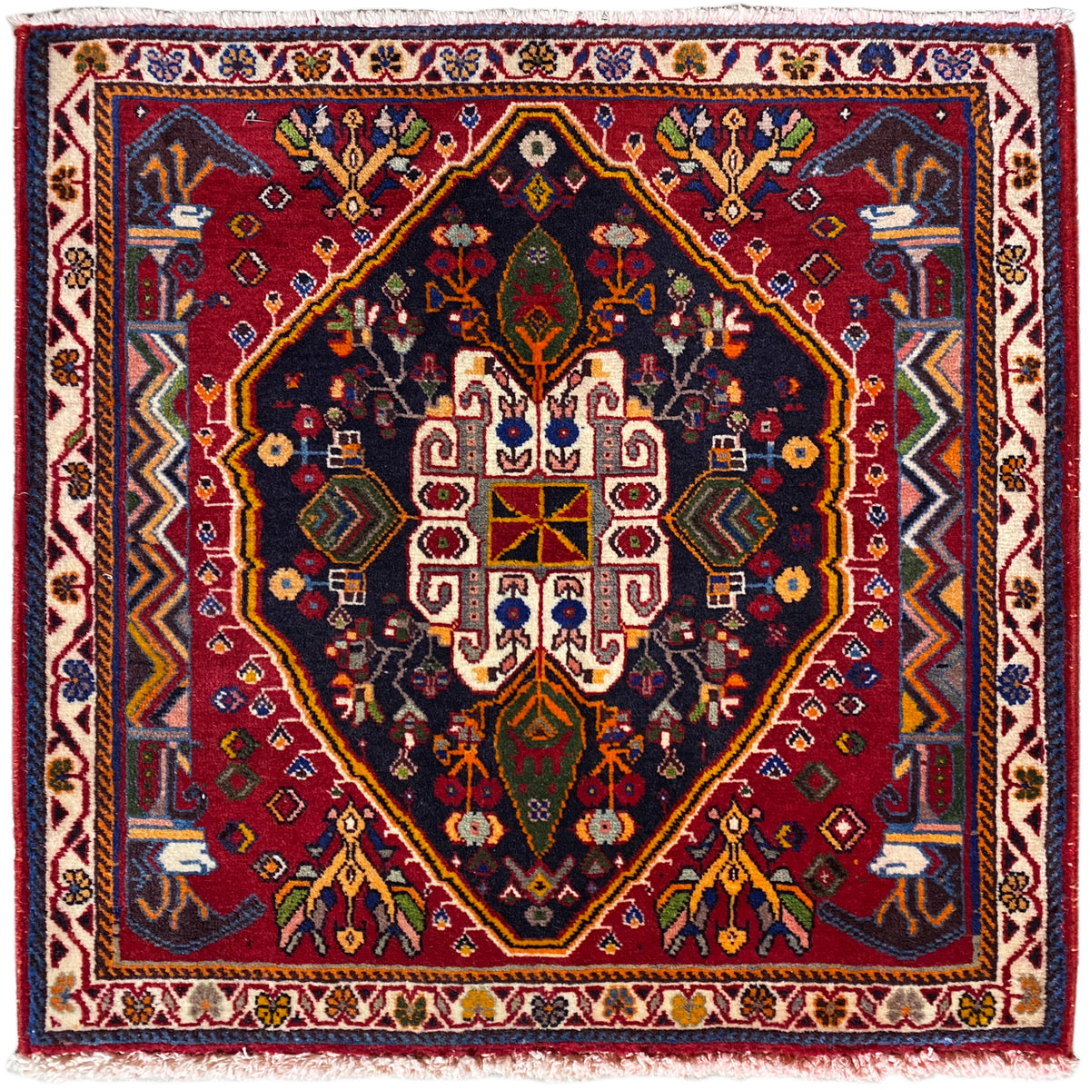 Poshti-Teppich (67×67 cm) mit dunklem Grund, Bordüre und geometrischem Medaillon