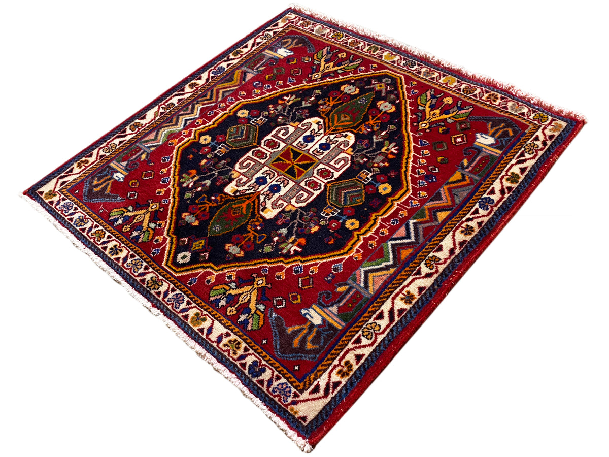 Poshti-Teppich (67×67 cm) diagonal: rotbraune Bordüre, blaues Feld mit Ornamenten