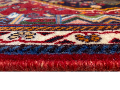 Poshti-Teppich: Fransennaht und Webkante mit Farbverlauf von Blau zu Rot