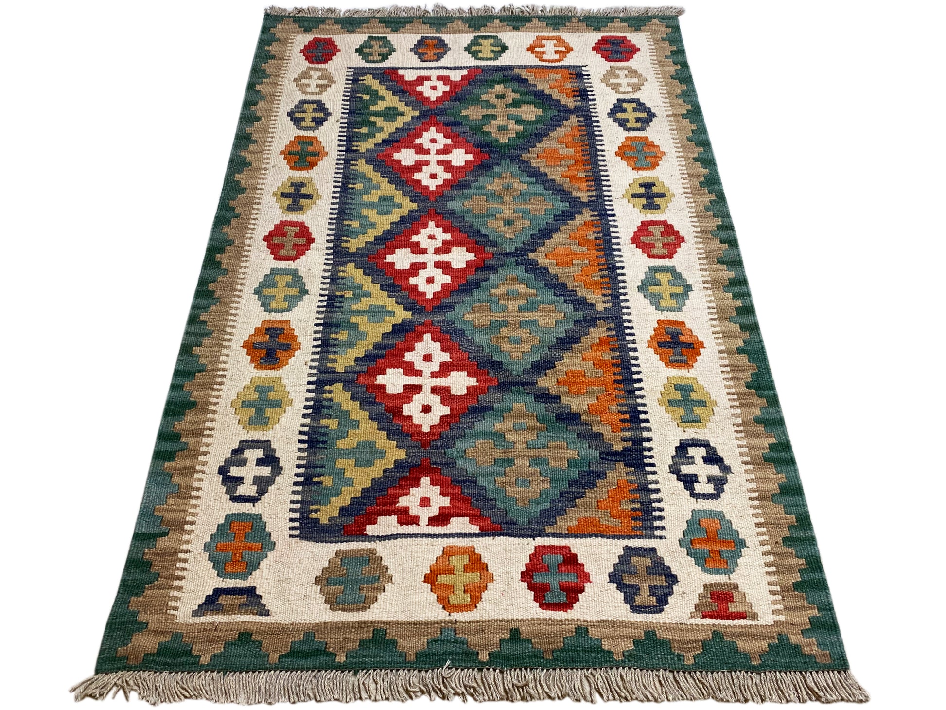 Boho Kelim Teppich grün mit farbigen geometrischen Motiven